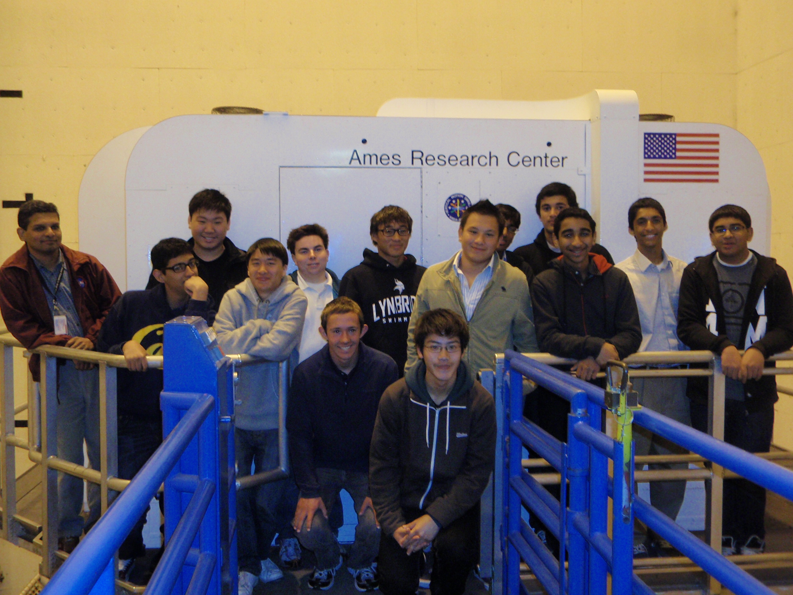 A group of students and staff taking a picture at the Ames Research Center.